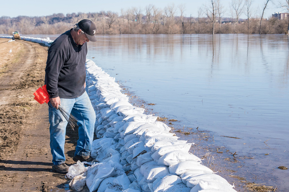 Ron Hook, western district commissioner or Buchanan County, inspects the levee in Elwood, Kansas, March 22, 2019. (U.S. Air National Guard photo by Tech. Sgt. Patrick Evenson)
