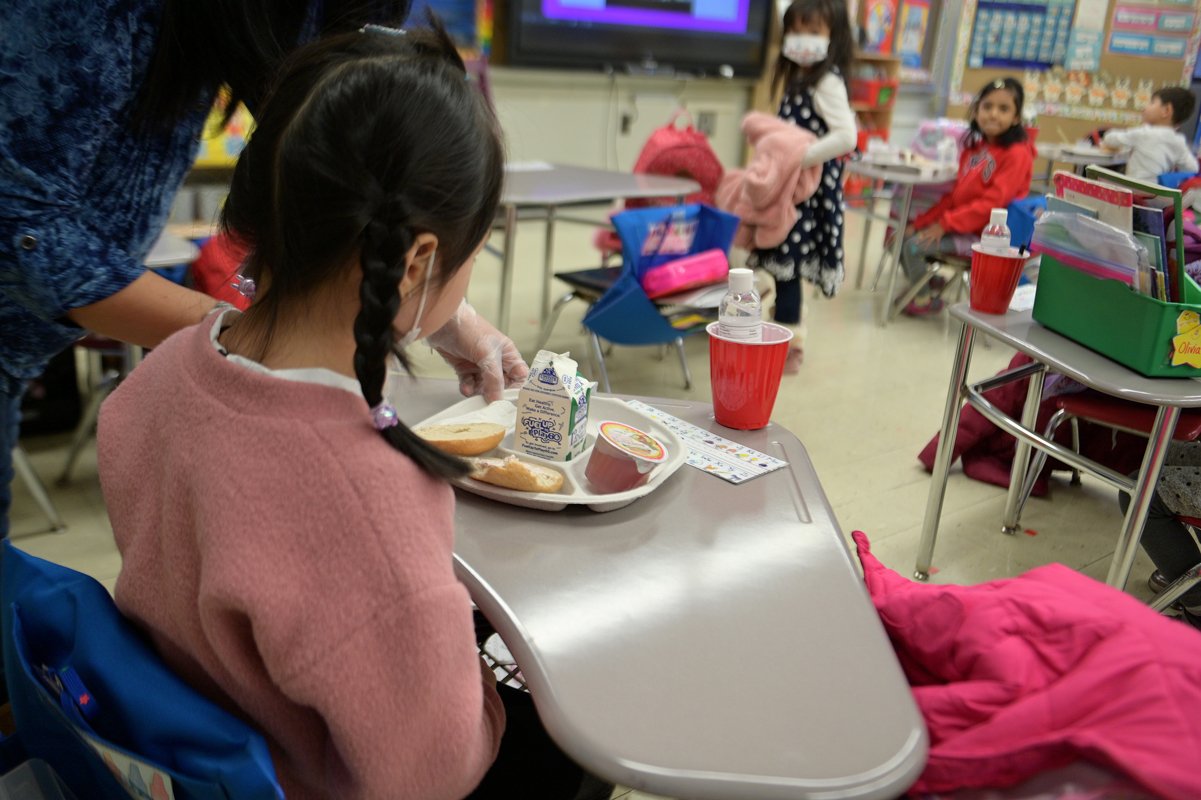 A kindergarten student eating breakfast at Yung Wing School P.S. 124 on January 13, 2021 in New York City.