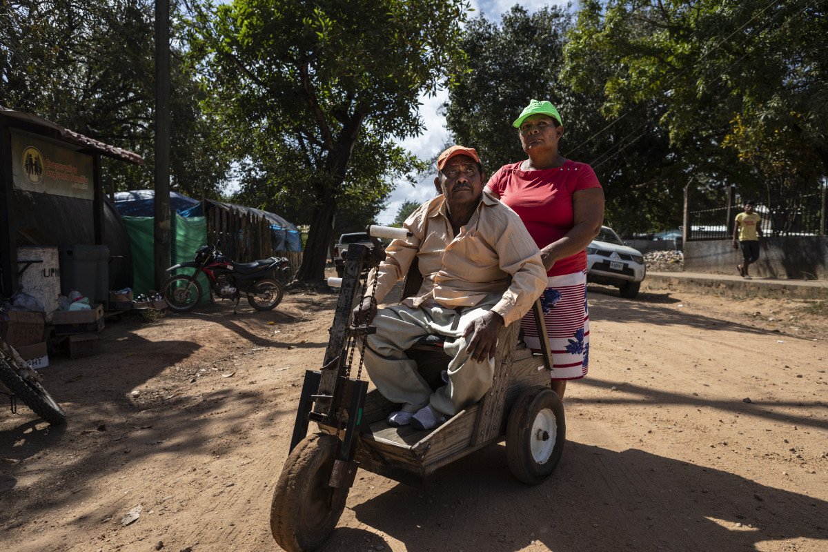 Filemón Cesión Gómez, a former lobster diver who gets around Puerto Lempira in a handmade wooden wheelchair said, “I was injured in 1980 at 25. Many men are dead or disappeared at sea.” (Photo credit: Jacky Muniello)