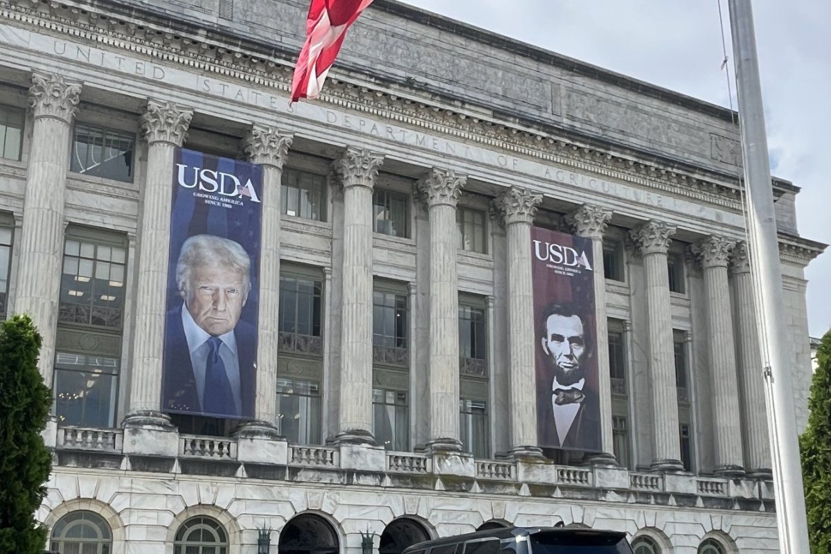 Banners of President Donald Trump and President Abraham Lincoln are hung on the facade of USDA headquarters in Washington, D.C., on May 15, 2025. (Photo credit: Lisa Held)